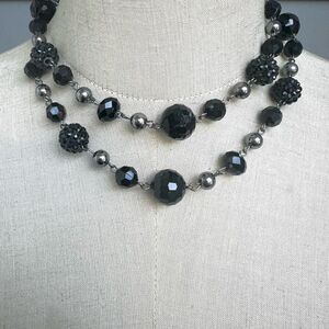 Black and silver tone long beaded necklace
